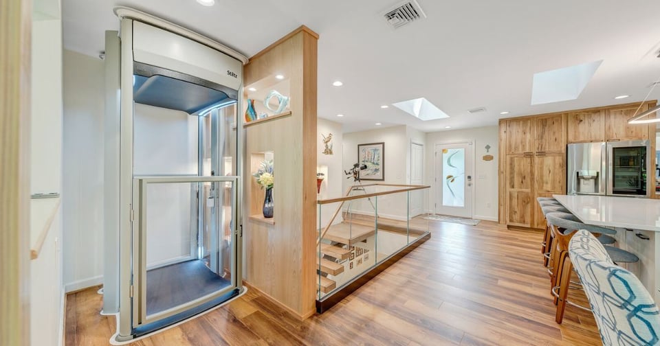 Grace Alon Custom Home Builder Roanoke project with open concept kitchen and home elevator installation.