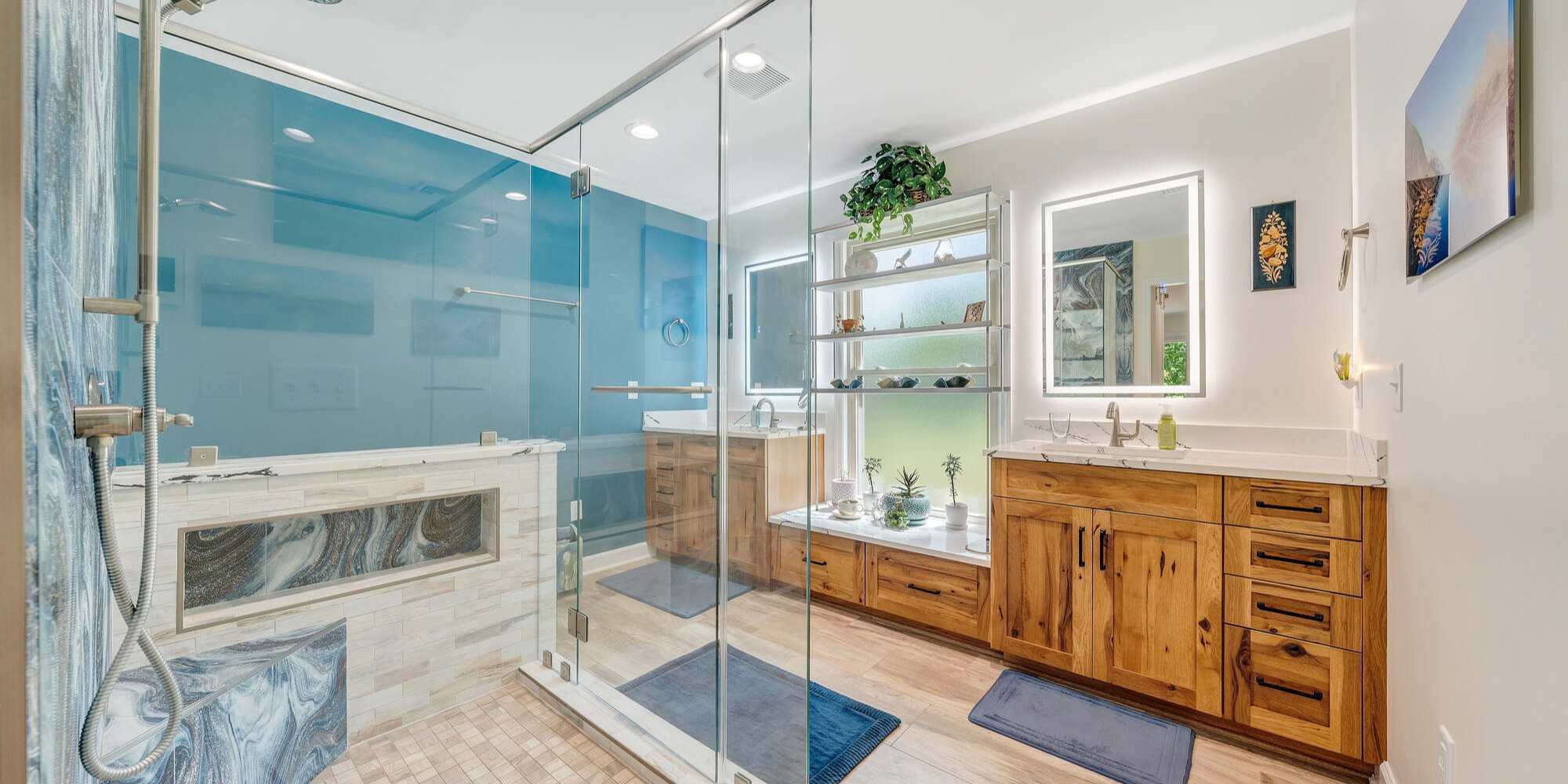 Luxurious primary bathroom in Smith Mountain Lake home by Grace Alon Builders with walk-in shower