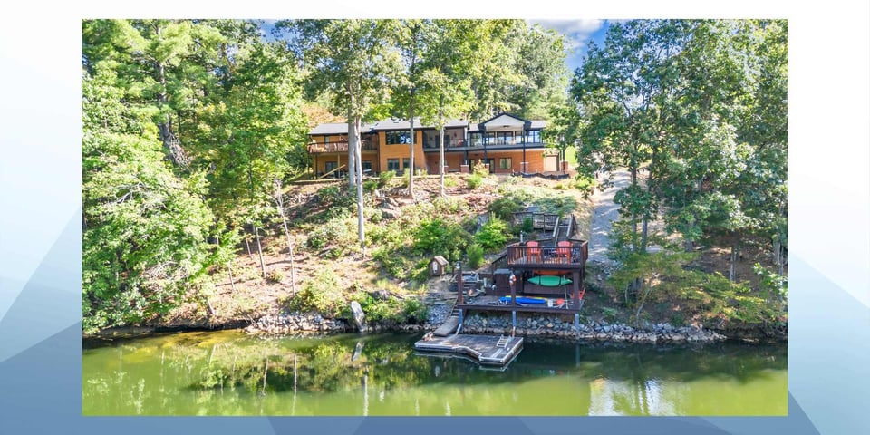 Home addition in Smith Mountain Lake, VA by Grace Alon Builders featuring multi-level outdoor living and waterfront views