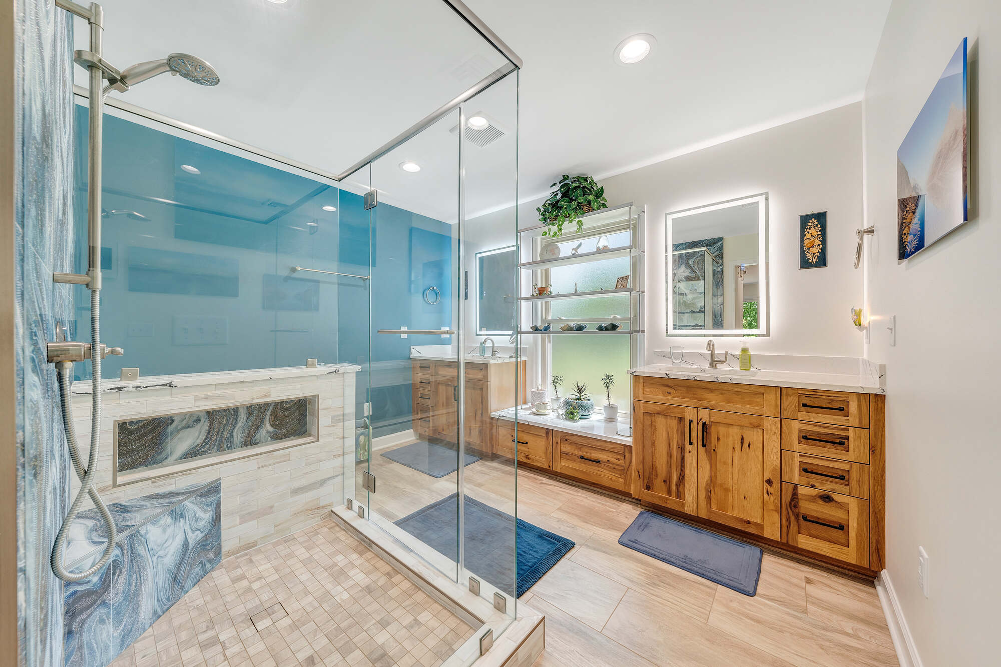 Luxurious primary bathroom in Smith Mountain Lake custom home by Grace Alon Builders with walk-in shower Luxurious primary bathroom in Smith Mountain Lake custom home by Grace Alon Builders with walk-in shower