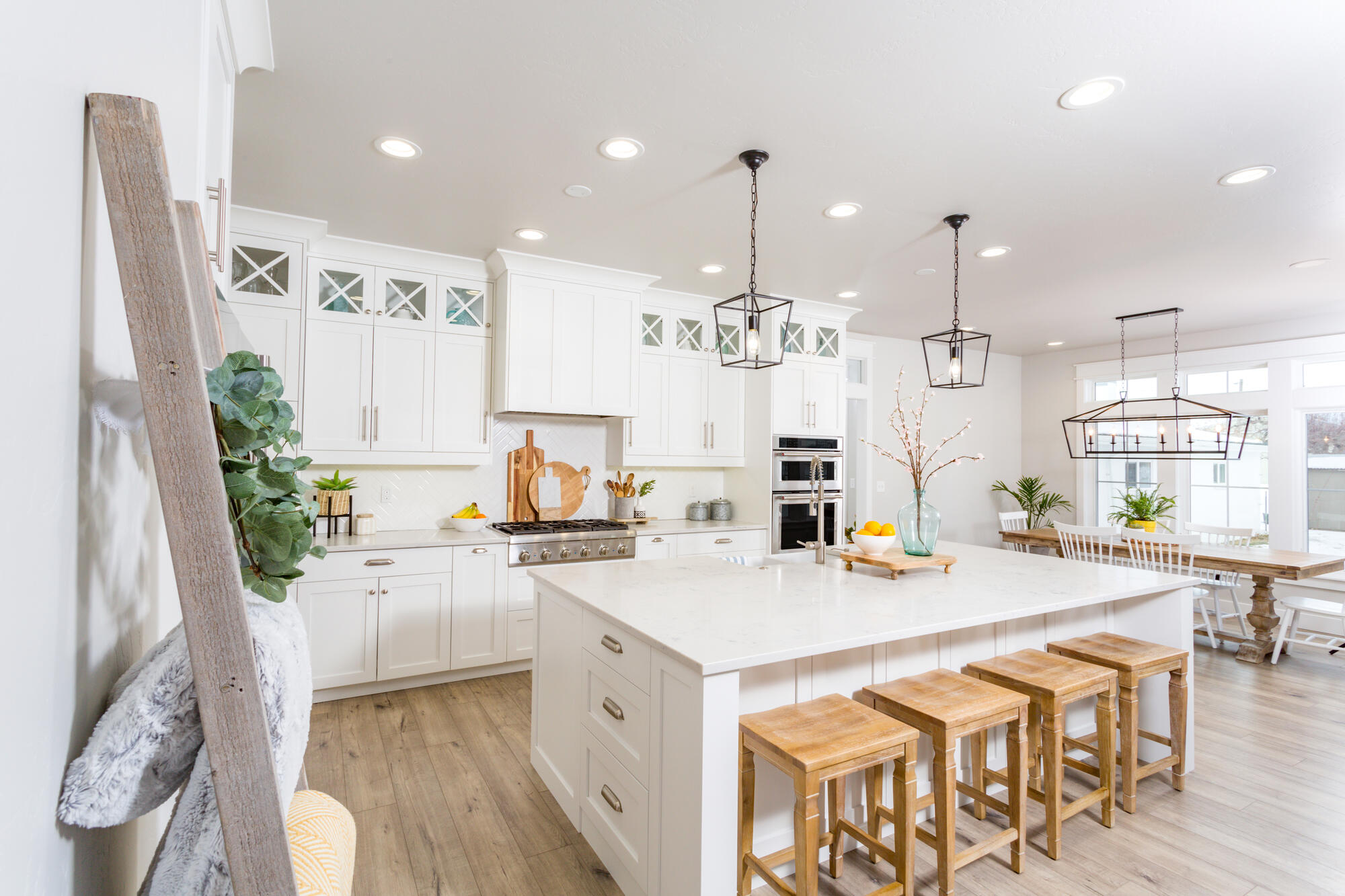 Spacious white farmhouse-style kitchen in a Roanoke County custom home by Grace Alon Builders Spacious white farmhouse-style kitchen in a Roanoke County custom home by Grace Alon Builders