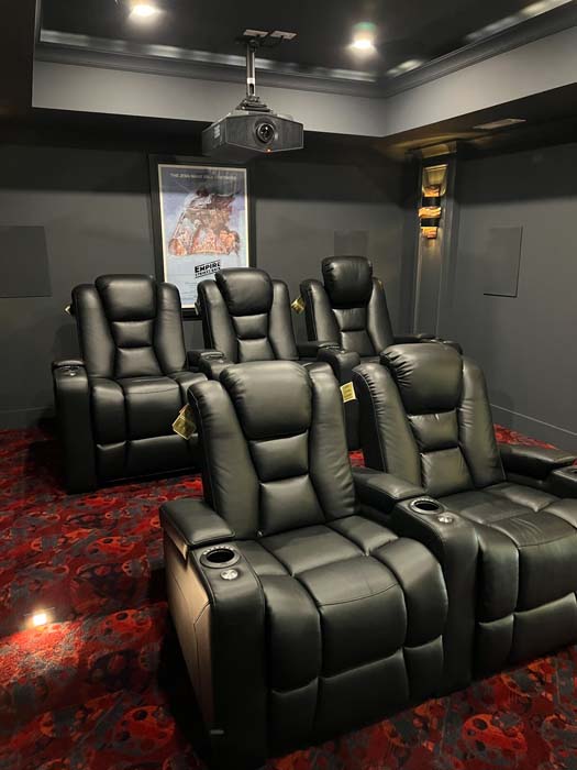 Grace Alon Builders custom home theater in Roanoke Metropolitan with luxury recliner seating