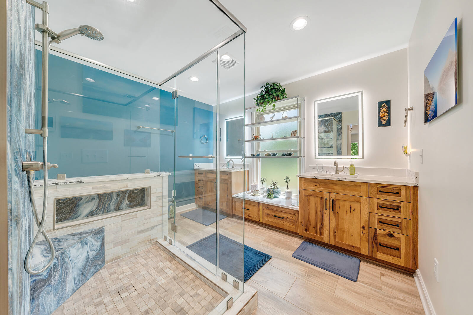 Luxurious primary bathroom in Smith Mountain Lake custom home by Grace Alon Builders with walk-in shower